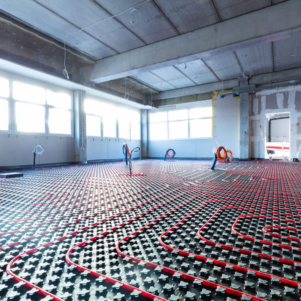Floor heating in a new building. Interior design and finishing industry. Office and apartment